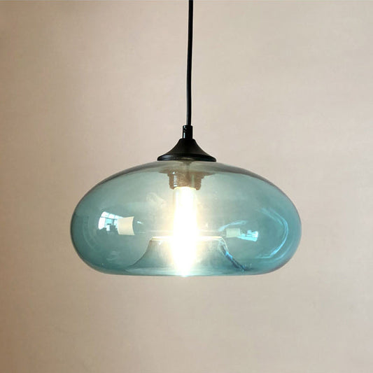 Luminaire Suspendu en Verre Coloré : Une Touche Moderne pour Illuminer Votre Espace